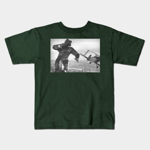 Kong Battles the Planes Kids T-Shirt by tedsox